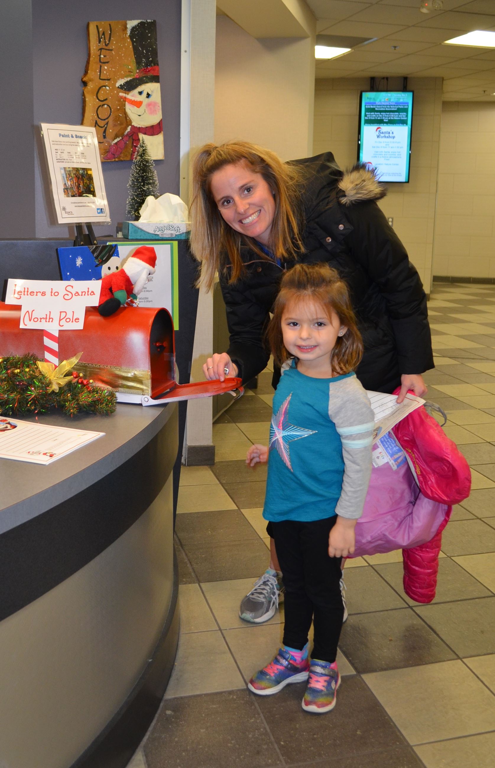 Girl with letter to Santa